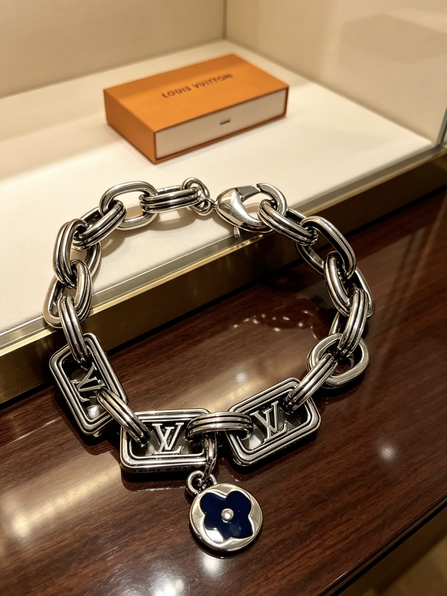 Louis Vuitton Silver Tone Bracelet with Monogram Charm